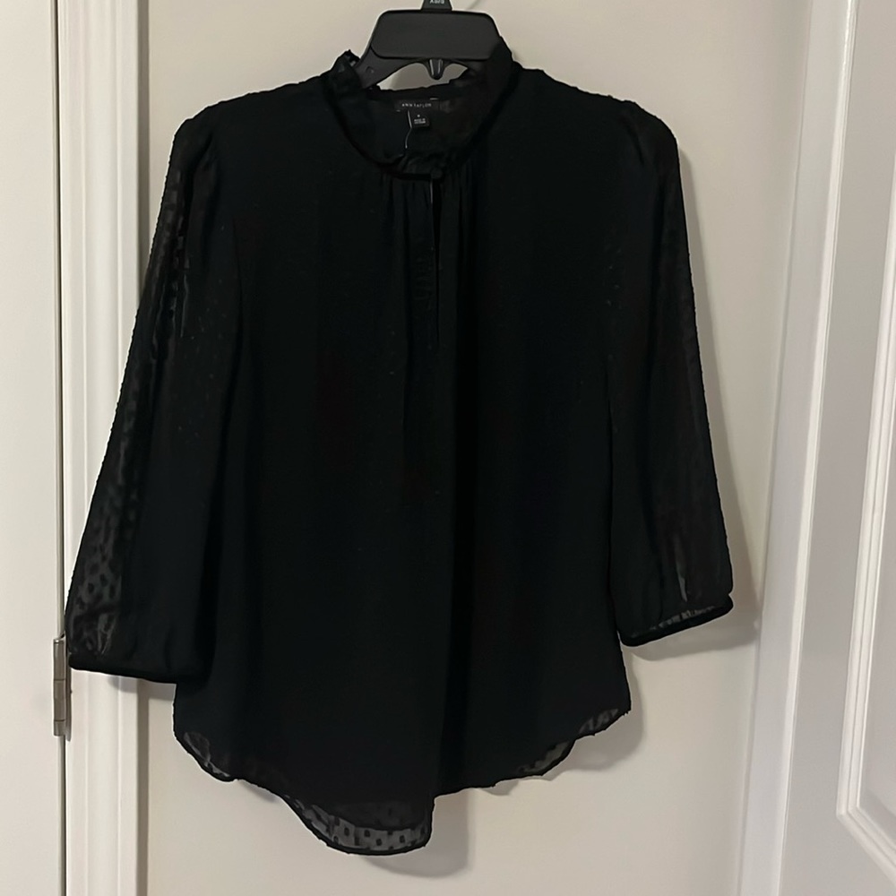 Ann Taylor black polka dot key hole blouse in size Medium